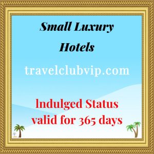 Framed ad announcing Indulged Status valid for 365 days for Small Luxury Hotels from travelclubvip.com, with small palm trees.
